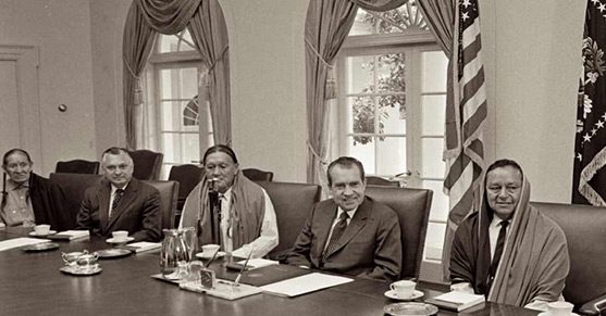 Former president Richard Nixon is seen with leaders of Taos Pueblo at the White House on July 8,1970.